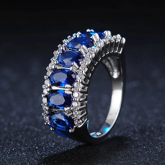Timeless Blue Gemstone & Silver Halo Ring-Ariette Jewelry