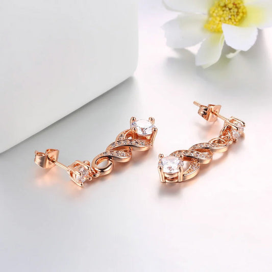 Timeless Rose Gold Sparkling Gemstone Twist Earrings-Ariette Jewelry